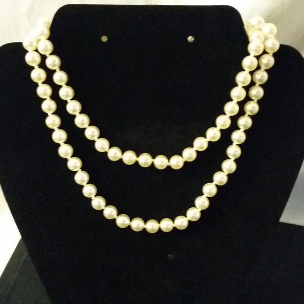 Pearl colored long stranded necklace